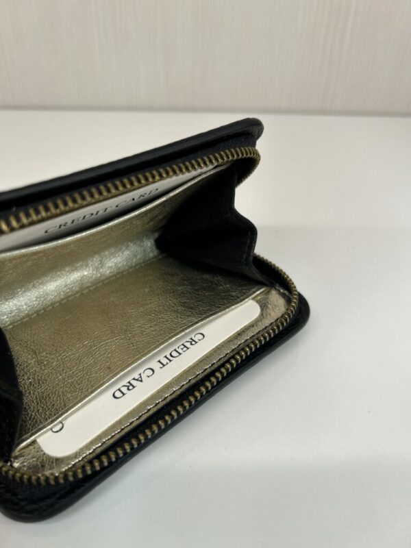 Mini Portefeuille femme cuir grainé noir/or Gérard Darel